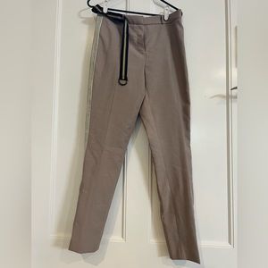 Beige slacks, blue/green striped belt included